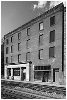 Railroad tracks and National Bank of Thurmond building. New River Gorge National Park and Preserve ( black and white)