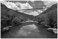 Kayak under New River Gorge Bridge. New River Gorge National Park and Preserve ( black and white)