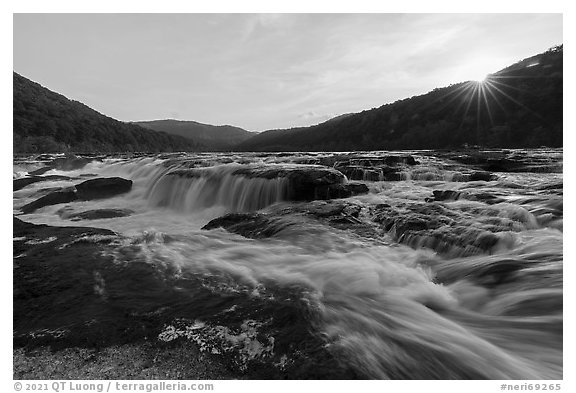 Sandstone Falls with sun star. New River Gorge National Park and Preserve (black and white)