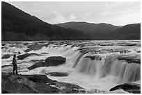 Visitor looking, Sandstone Falls. New River Gorge National Park and Preserve ( black and white)