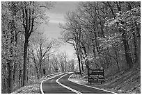 Skyline drive with Park entrance sign. Shenandoah National Park, Virginia, USA. (black and white)