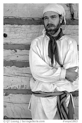 Park staff wearing white period outfit similar to that worn by  Voyageurs. Voyageurs National Park, Minnesota, USA.