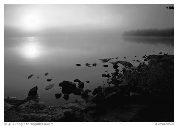 Rocky shoreline, Sunrise and morning fog, Kabetogama Lake. Voyageurs National Park (black and white)