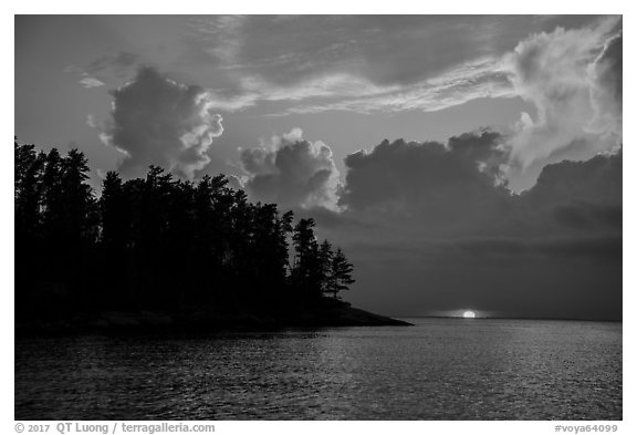 Sun setting below cloud, Rainy Lake. Voyageurs National Park (black and white)