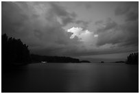 Anderson Bay at dusk, with lights of houseboat. Voyageurs National Park ( black and white)