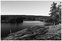 Visitor looking, Anderson Bay. Voyageurs National Park ( black and white)