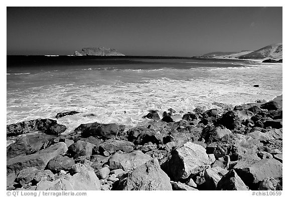 Surf foam and rocks, Cuyler Harbor, mid-day, San Miguel Island. Channel Islands National Park, California, USA.