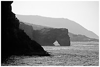 Coastline with sea arch, Santa Cruz Island. Channel Islands National Park, California, USA. (black and white)