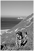 Backpackers in Nidever canyon , San Miguel Island. Channel Islands National Park, California, USA. (black and white)