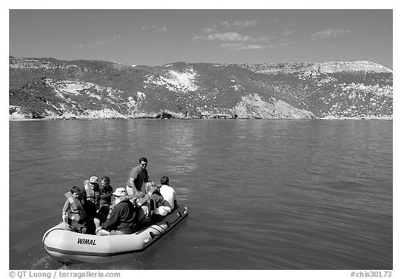 Campers using a skiff to land, San Miguel Island. Channel Islands National Park, California, USA.