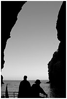 Looking out from inside Painted Cave, Santa Cruz Island. Channel Islands National Park, California, USA. (black and white)