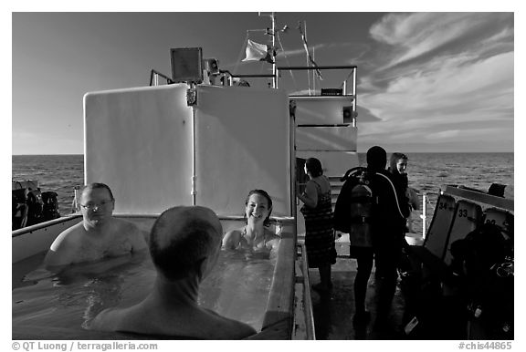 Soaking in hot tub on diving boat, Annacapa Island. Channel Islands National Park (black and white)