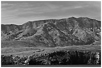 Tall hill ridge and cliff seen from ocean, Santa Cruz Island. Channel Islands National Park ( black and white)