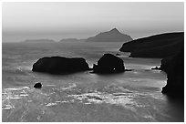 Rocks and Anacapa Islands a dawn, Santa Cruz Island. Channel Islands National Park, California, USA. (black and white)