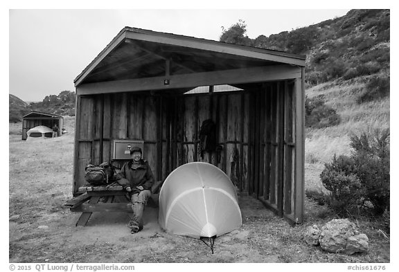 Camper, tent, wind shelter, Santa Rosa Island. Channel Islands National Park (black and white)