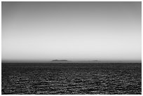 Sunrise over Catalina Island from Santa Barbara Island. Channel Islands National Park ( black and white)