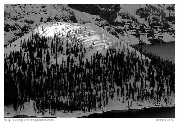 Last rays of sun on Wizard Island. Crater Lake National Park (black and white)