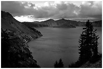 Tree, lake and clouds, Sun Notch. Crater Lake National Park, Oregon, USA. (black and white)