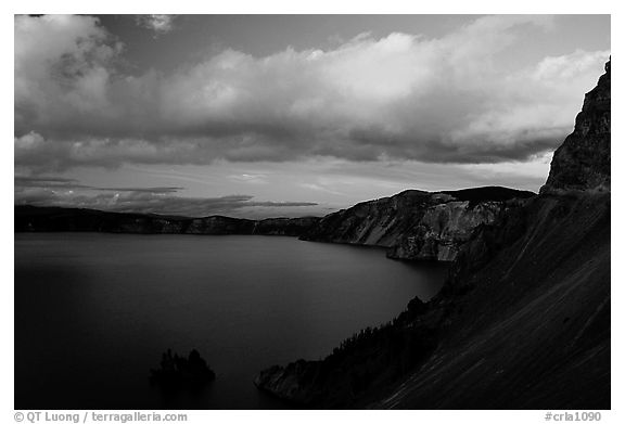 Phantom ship and lake seen from Sun Notch, sunset. Crater Lake National Park (black and white)