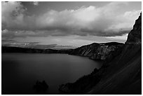 Phantom ship and lake seen from Sun Notch, sunset. Crater Lake National Park, Oregon, USA. (black and white)