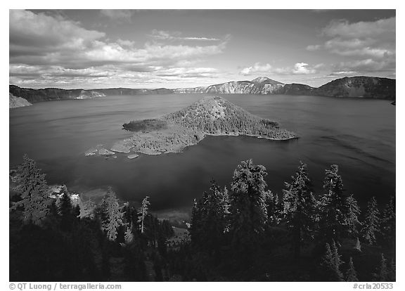 Wide view of lake with Wizard Island, afternoon. Crater Lake National Park, Oregon, USA.