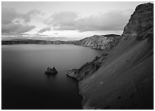Caldera slopes and Phantom ship at dusk. Crater Lake National Park, Oregon, USA. (black and white)