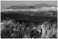 Lake rim and forest, and hills. Crater Lake National Park, Oregon, USA. (black and white)