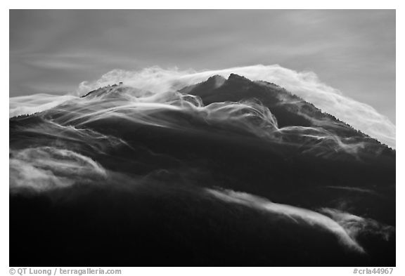 Cloudcap over backlit Mt Scott summit. Crater Lake National Park (black and white)