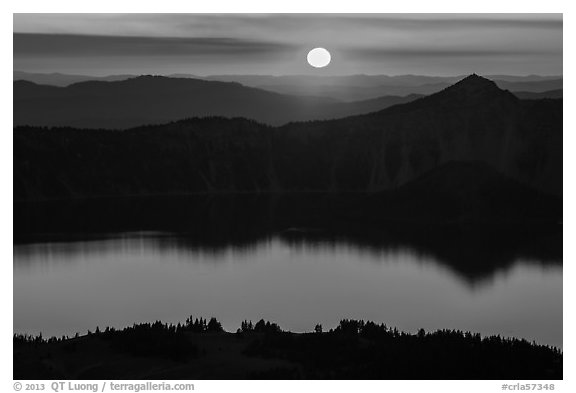 Sun setting over Crater Lake and Llao Rock. Crater Lake National Park (black and white)