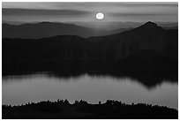 Sun setting over Crater Lake and Llao Rock. Crater Lake National Park ( black and white)
