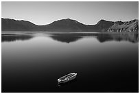 Tour boat and blue lake. Crater Lake National Park ( black and white)