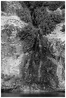 Chaski Slide waterfall flowing into lake. Crater Lake National Park ( black and white)