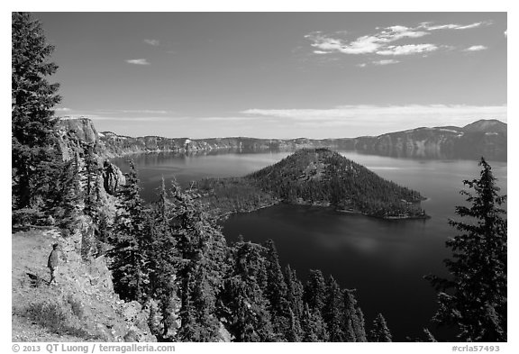 Visitor looking, Wizard Island and lake. Crater Lake National Park (black and white)
