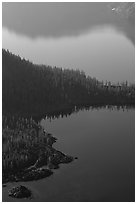 Wizard Island and crater rim reflection, early morning. Crater Lake National Park, Oregon, USA. (black and white)