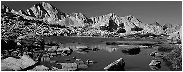 High Sierra peaks reflected in blue alpine lake. Kings Canyon  National Park (Panoramic black and white)