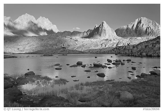 North Palissade, Isocele Peak and Mt Giraud reflected in lake, Dusy Basin. Kings Canyon National Park, California, USA.