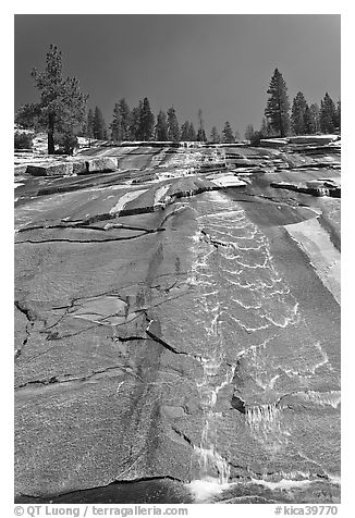 Water cascade over granite slab, Le Conte Canyon. Kings Canyon National Park, California, USA.