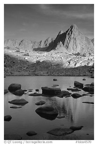 Isoceles Peak reflected in a lake in Dusy Basin, late afternoon. Kings Canyon National Park, California, USA.