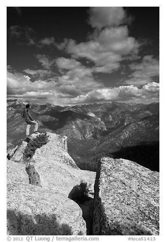 Hiker taking in view from Lookout Peak. Kings Canyon National Park, California, USA.