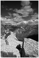 Hiker taking in view from Lookout Peak. Kings Canyon National Park, California, USA. (black and white)