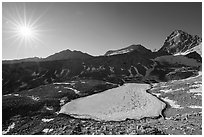Sun and frozen lake from Forester Pass. Kings Canyon National Park ( black and white)
