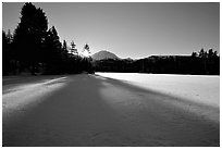 Frozen Manzanita Lake, winter sunrise. Lassen Volcanic National Park ( black and white)