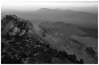 Summit of Lassen Peak with volcanic formations, sunset. Lassen Volcanic National Park, California, USA. (black and white)