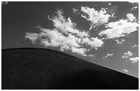 Smooth cinder cone profile and clouds. Lassen Volcanic National Park ( black and white)