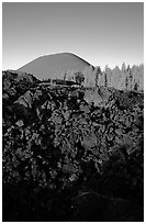 Fantastic lava beds and cinder cone, sunrise. Lassen Volcanic National Park, California, USA. (black and white)