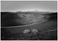 Sagebrush bushes, Cinder cone rim, and Lassen Peak, sunrise. Lassen Volcanic National Park ( black and white)