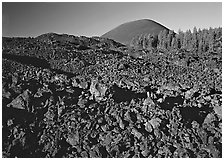 Fantastic lava beds and cinder cone, early morning. Lassen Volcanic National Park, California, USA. (black and white)