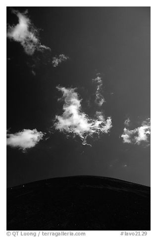 Clouds and round cinder cone. Lassen Volcanic National Park, California, USA.