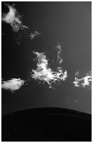 Clouds and round cinder cone. Lassen Volcanic National Park, California, USA. (black and white)
