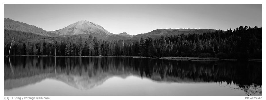 Lassen Peak reflected in Manzanita lake at sunset. Lassen Volcanic National Park (black and white)